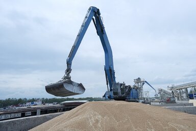 FILE - An excavator loads grain into a cargo ship at a grain port in Izmail, Ukraine, on April 26, 2023. Russia has suspended on Monday July 17, 2023 a wartime deal brokered by the U.N. and