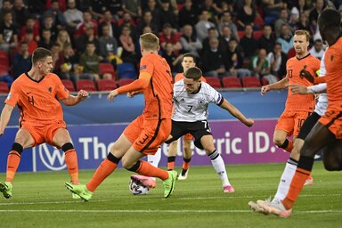Florian Wirtz of Germany, center, scores his team's second goal during the Euro U21 semifinal soccer match between Netherlands and Germany in Szekesfehervar, Hungary, Thursday, June 03, 2021. (Zsolt Szigetvary/MTI via AP)